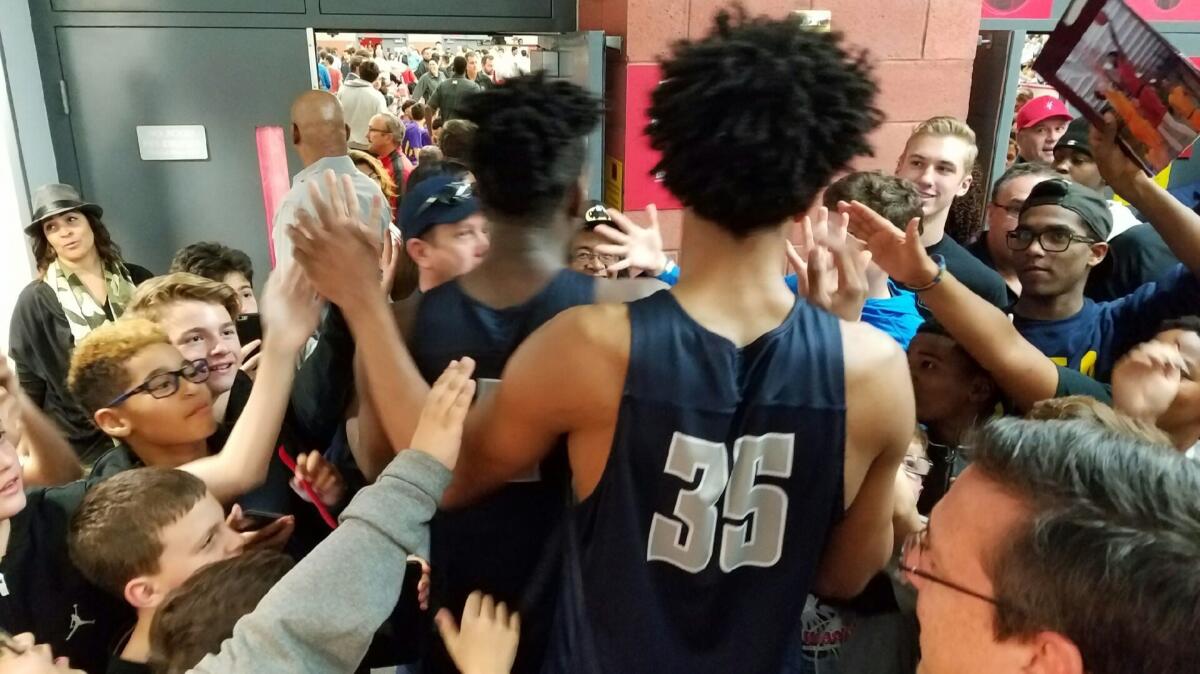 Adoring fans mob Marvin Bagley III of Sierra Canyon.