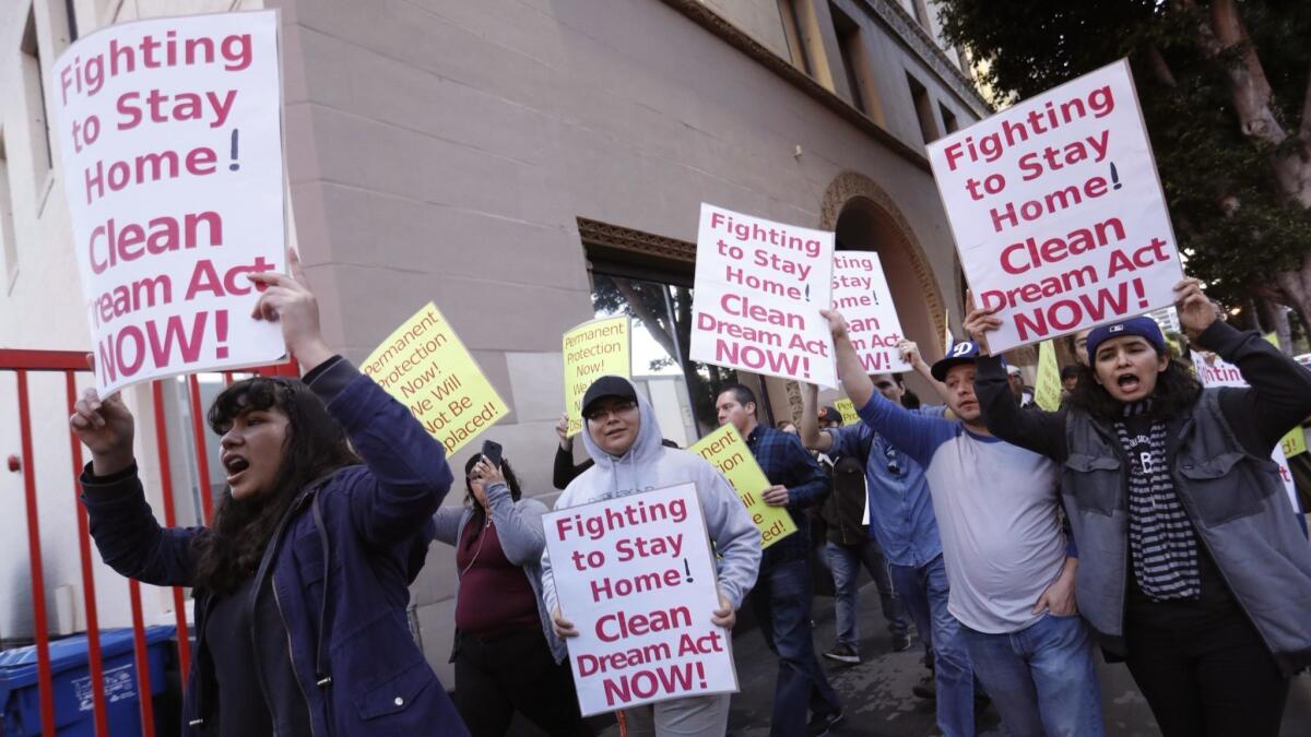 Members of California for Progress, Deferred Action for Childhood Arrivals recipients and others march in L.A.'s Westlake District in February in support of a "clean" Dream Act that would provide a pathway to citizenship for DACA recipients.