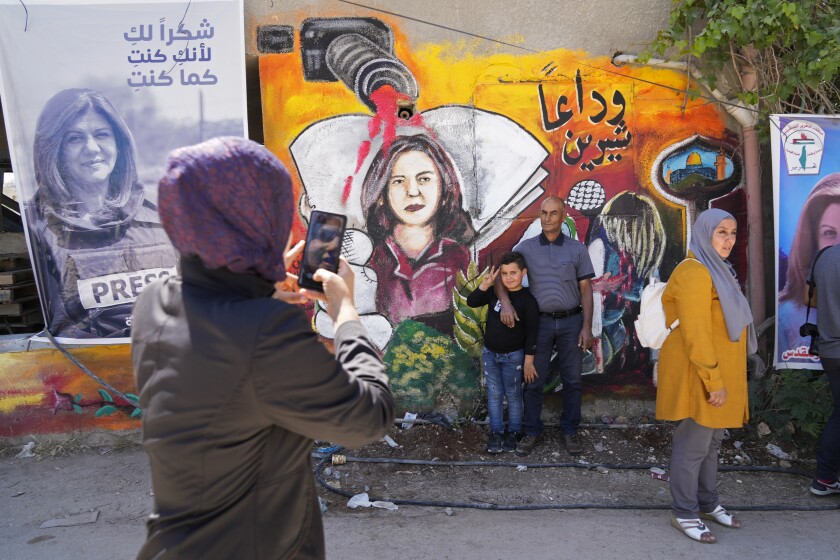 Palestinians visit the site where veteran Palestinian-American reporter Shireen Abu Akleh was shot and killed.