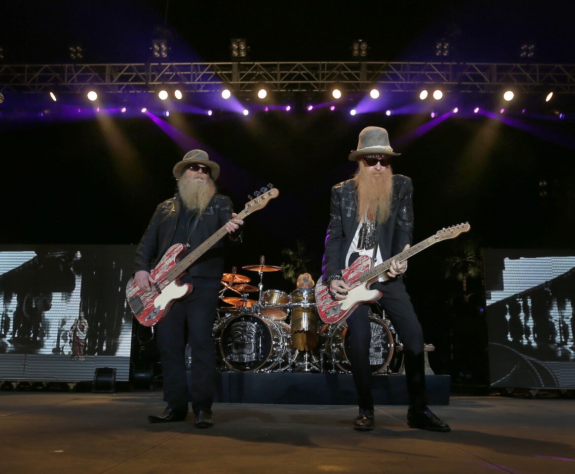 Bassist Dusty Hill, left, and guitarist Billy Gibbons of ZZ Top perform on the Palomino Stage at the Stagecoach Country Music Festival on April 25.
