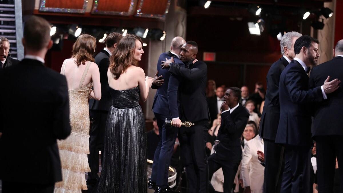 The cast of "Moonlight" takes the stage after winning the award for best picture at the Oscars on Feb. 26 at the Dolby Theatre in Los Angeles.