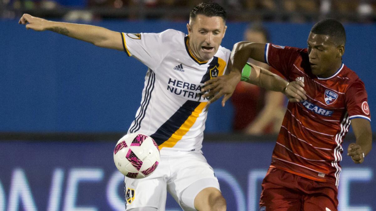 Galaxy forward Robbie Keane, battling FC Dallas midfielder Carlos Gruezo, says he's not ready for the season to end with a quick playoff exit.