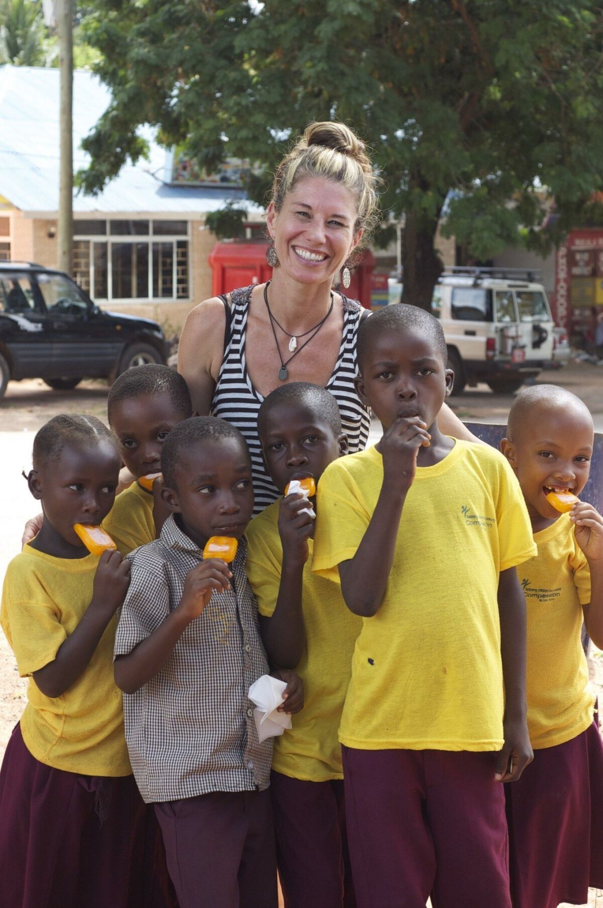The author and her six sponsored children enjoy popsicles, (from left) Mariam, Angelina, Bahati, Augustino, Jadone and Nema. Benjamin Myers photo