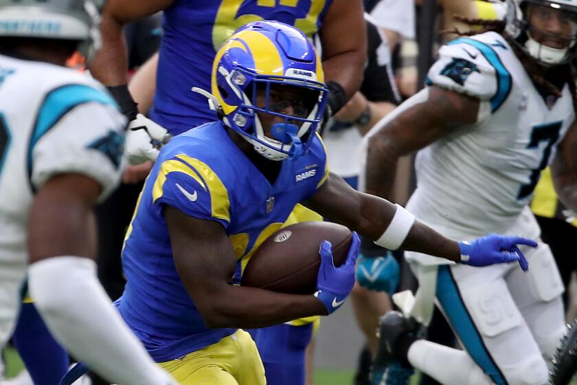 INGLEWOOD, CALIF. - OCT. 16, 2022. Rams wide receiver Brandon Powell gets extra yardage.