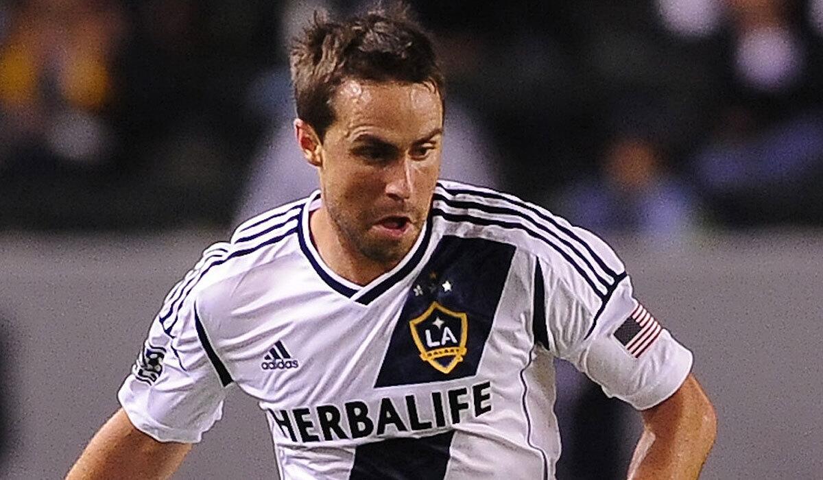Todd Dunivant plays for the Galaxy in 2013. He announced Wednesday that he'll retire at the end of the season.