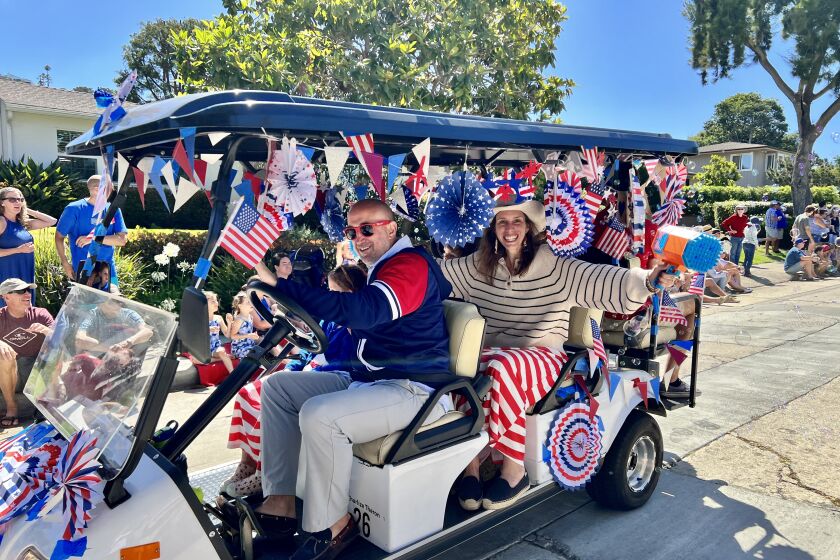 A bubble gun accessorizes this patriotic cart down Beaumont Avenue in Bird Rock during the area's Fourth of July parade.