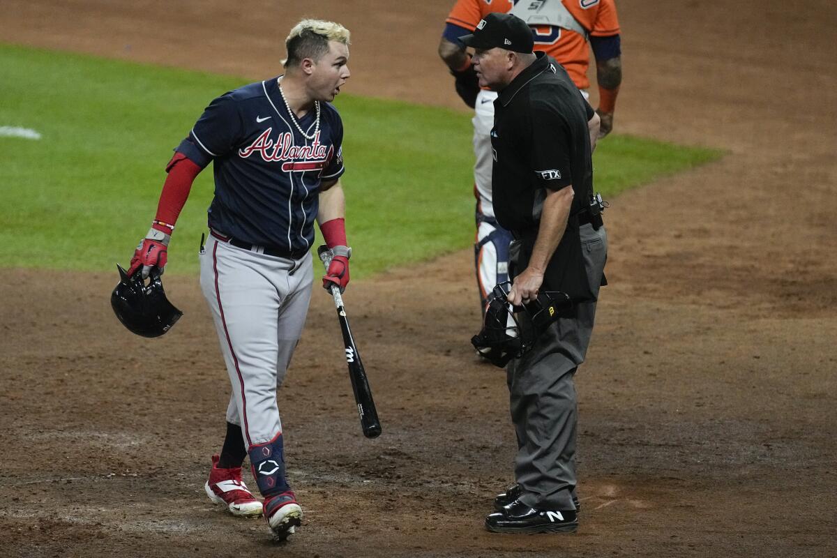 Joc Pederson argues a call with home plate umpire Ron Kulpa during the eighth inning in Game 2.