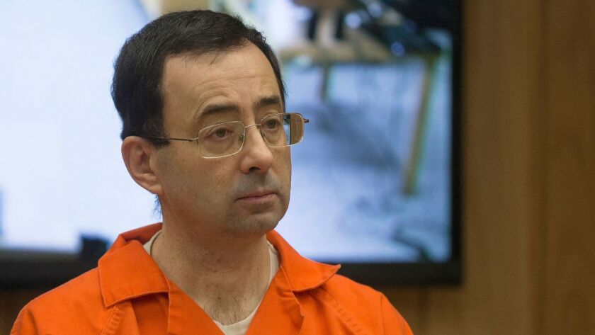 Former Michigan State University and USA Gymnastics doctor Larry Nassar appears in a Michigan court for the final phase of his sentencing on Feb. 5, 2018.