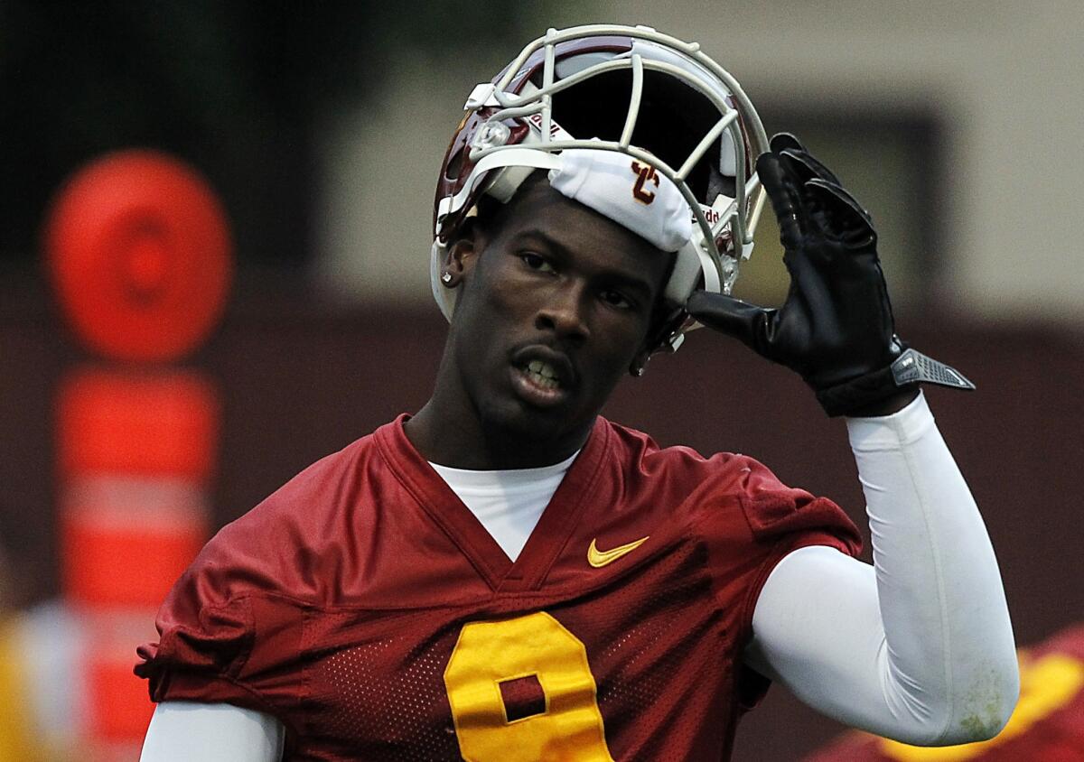 USC wide receiver Marqise Lee says, "I was not offered anything, I did not get anything" from a person who asked him to sign photographs in Miami earlier this year.