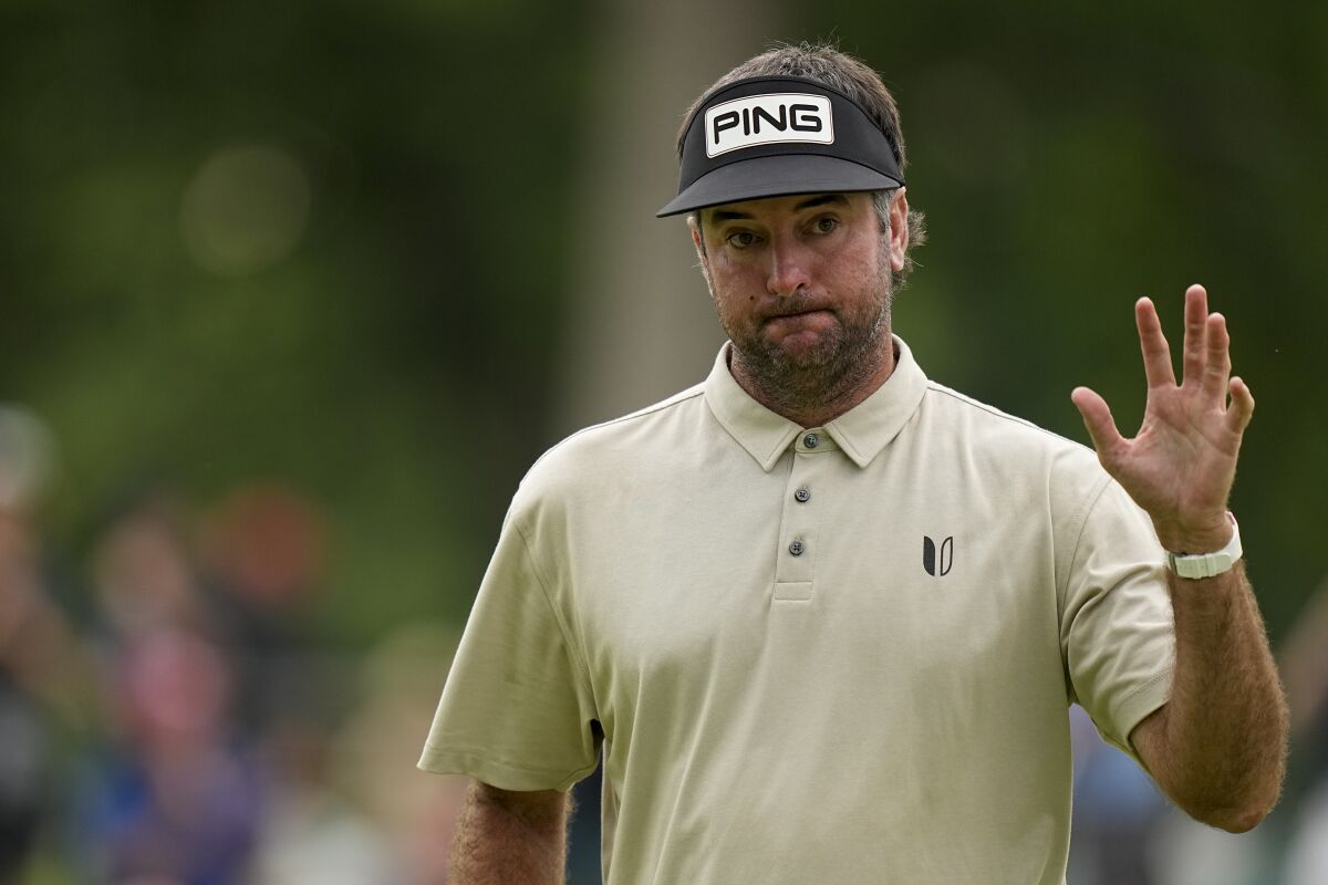 Bubba Watson waves after making a putt on the 15th hole during the second round of the PGA Championship golf tournament at Southern Hills Country Club, Friday, May 20, 2022, in Tulsa, Okla. (AP Photo/Eric Gay)