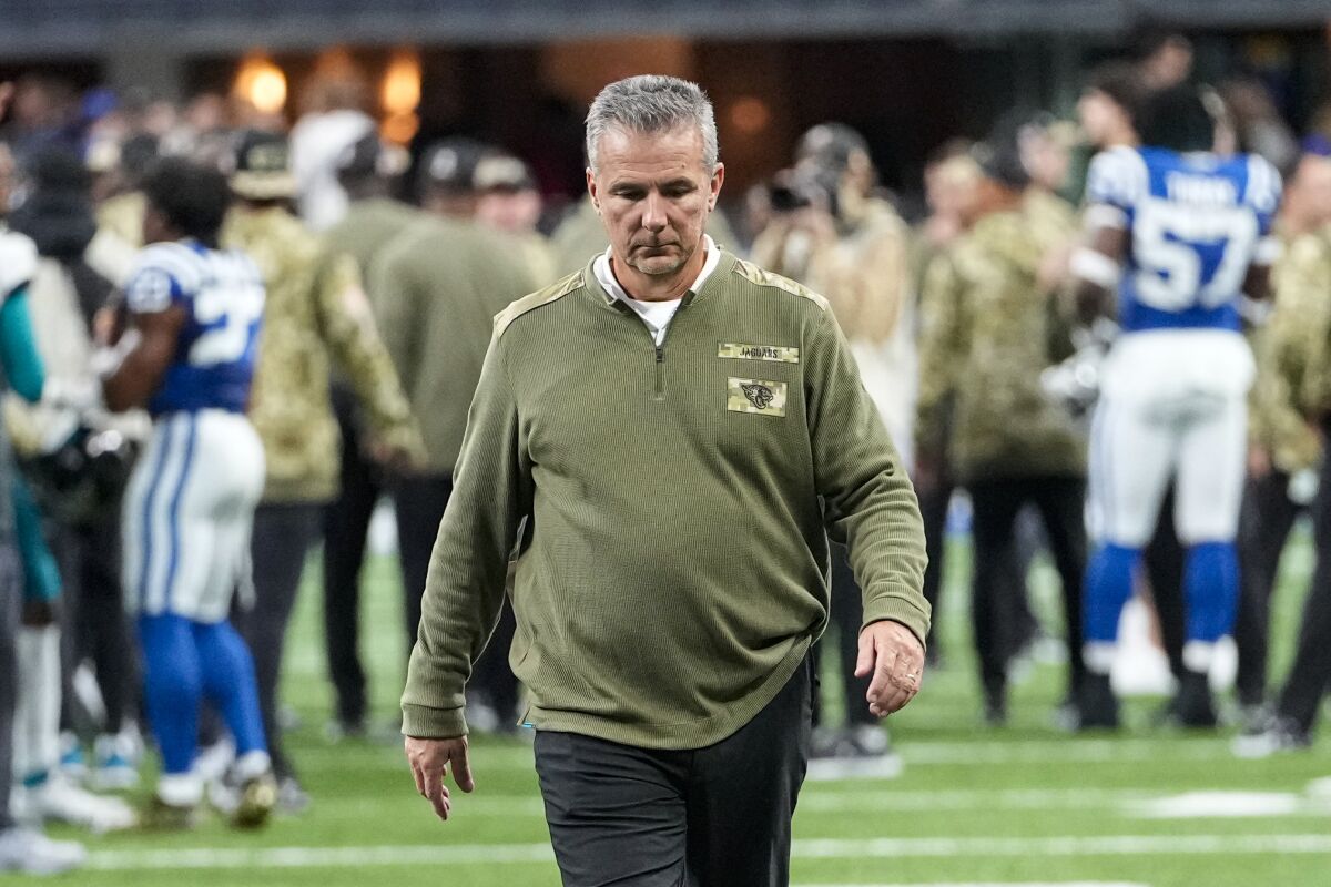 Jacksonville Jaguars head coach Urban Meyer walks off the field following a 23-17 loss to the Indianapolis Colts in an NFL football game in Indianapolis, Sunday, Nov. 14, 2021. (AP Photo/AJ Mast)