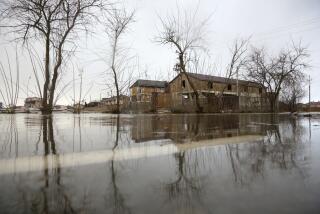 The Evpatoria - Saki highway is covered with water after a storm in Crimea, Monday, Nov. 27, 2023. A storm in the Black Sea took down power grids and left almost half a million people without power after it flooded roads, ripped up trees and damaged buildings in Crimea, Russian state news agency Tass said. (AP Photo)