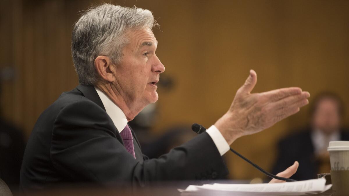 Federal Reserve Chairman Jerome Powell testifies before a Senate committee Tuesday. Stocks rose after his comments, but those gains later faded away.