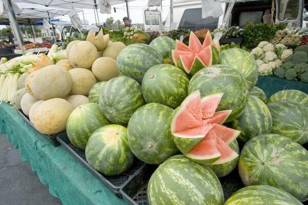 Watermelons and canteloupes grown by Uriostegui Farm in Redlands, at the Hawthorne Del Aire farmers market.