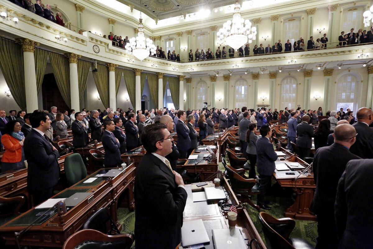 California lawmakers, shown before Gov. Jerry Brown's State of the State speech in January, are tackling a new round of questions about the state's climate policies.