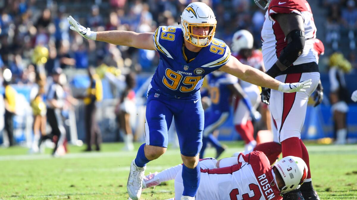 Jerry Tillery and Joey Bosa of the Los Angeles Chargers celebrate