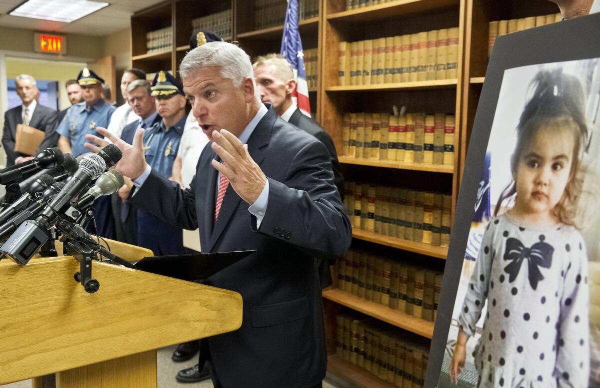 Suffolk County Dist. Atty. Daniel Conley speaks to the media in Bston on Sept. 18, discussing developments in the case of Bella Bond, who became known as Baby Doe.