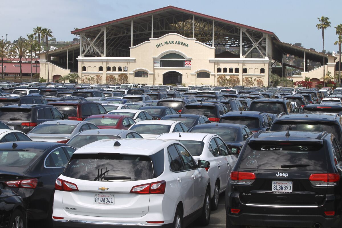 Rental cars companies are storing thousands of vehicles at the Del Mar Fairgrounds, seen in April.