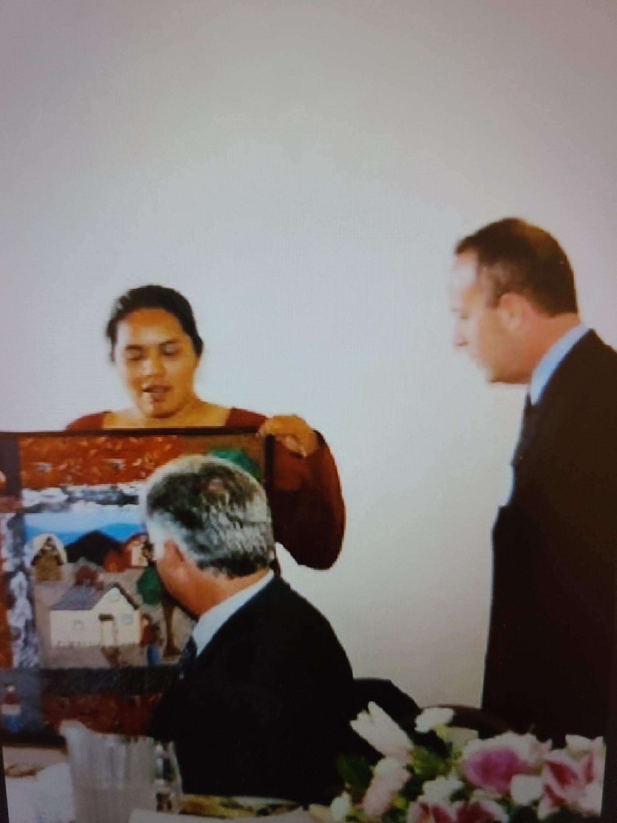 Sumi Juan, Charlene's mother, presents a quilt square she made to state lawmaker Darrell Steinberg, now Sacramento's mayor.