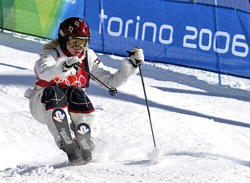 Michelle Roark of the United States keeps her form during qualifying for the finals of the freestyle moguls competition. She finished fourth in qualifying, but 18th in the final.