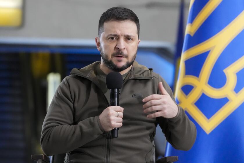 FILE - Ukrainian President Volodymyr Zelenskyy answers media questions during a press conference in a city subway under a central square in Kyiv, Ukraine, April 23, 2022. U.S. intelligence agencies underestimated Zelenskyy and Ukraine while overestimating Russia and Russian President Vladimir Putin, even as they accurately predicted Putin would order an invasion. (AP Photo/Efrem Lukatsky, File)