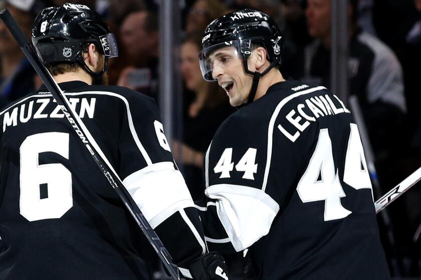 Kings center Vincent Lecavalier (44) celebrates after assisting Jake Muzzin on a goal against the Maple Leafs during the third period of their game Thursday.