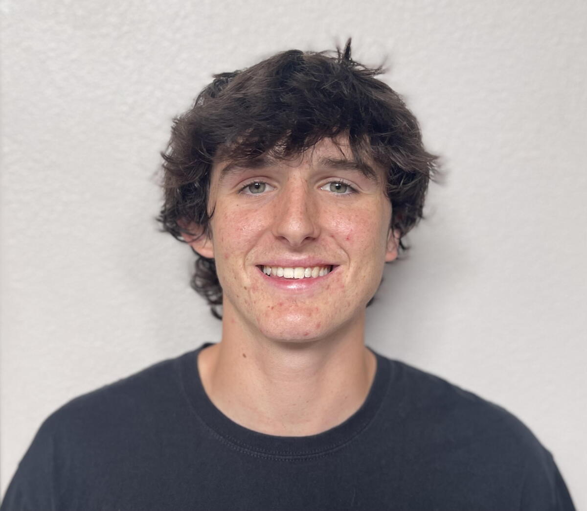 Ty Plinski of Corona Centennial High smiles as he poses for a photo.