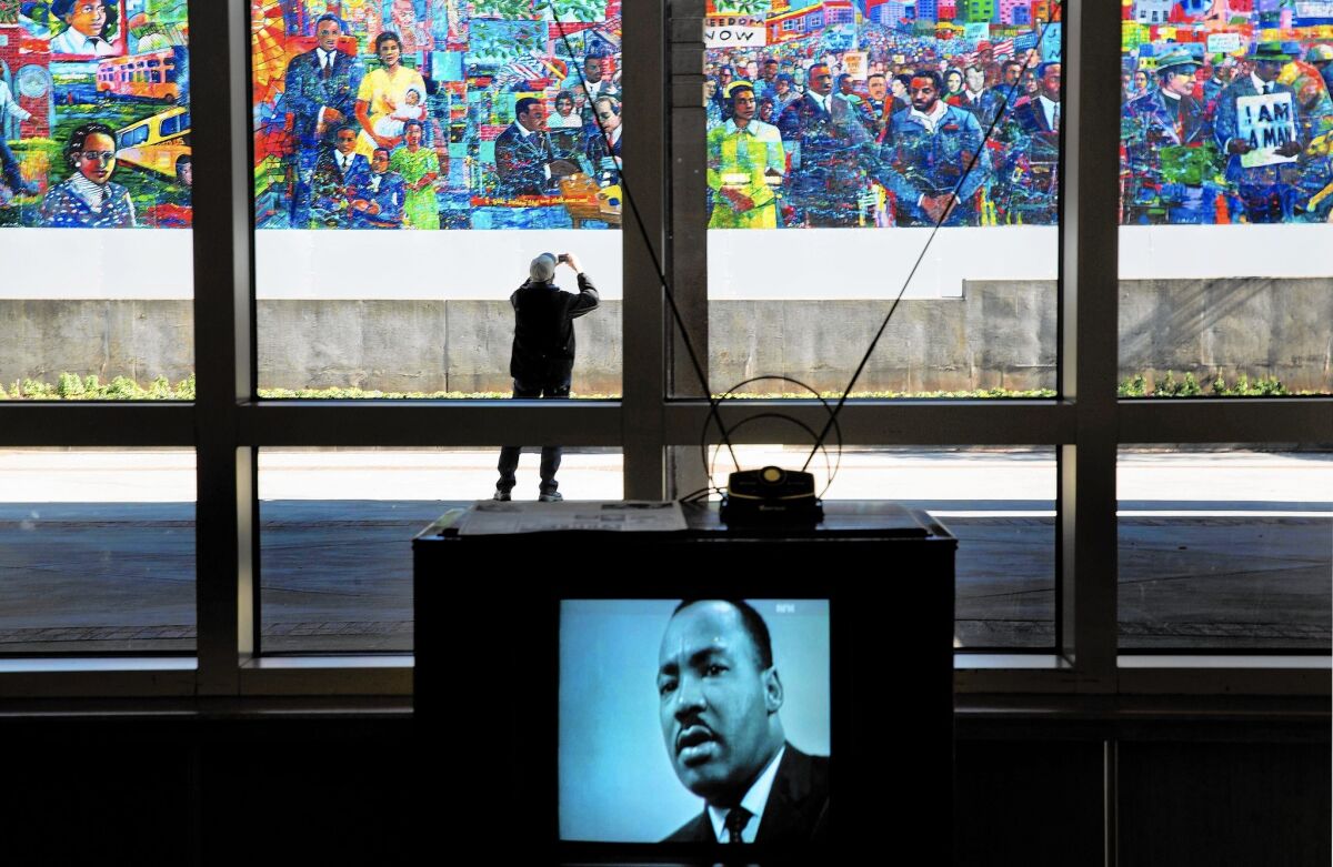 An image of the Rev. Martin Luther King Jr. is displayed on a vintage television at the King Center in Atlanta. The nonprofit center may lose its right to use King's intellectual and physical property.