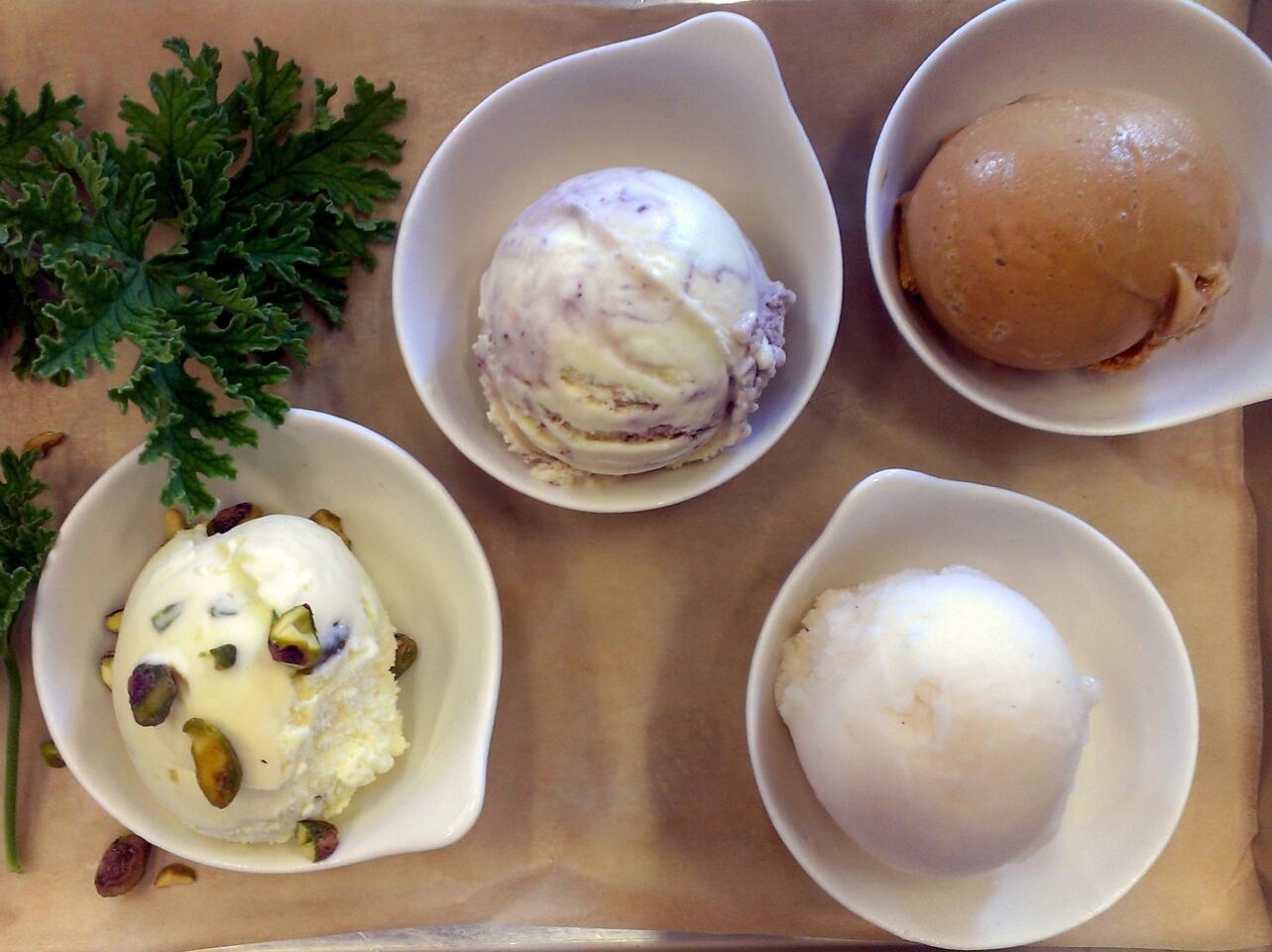 A few of the ice cream flavors at the Sweet Rose Creamery in Santa Monica, from left, include: rose geranium with salty pistachio; creme fraiche with elderberry and pink peppercorn swirl; salted caramel; and pear Riesling sorbet.