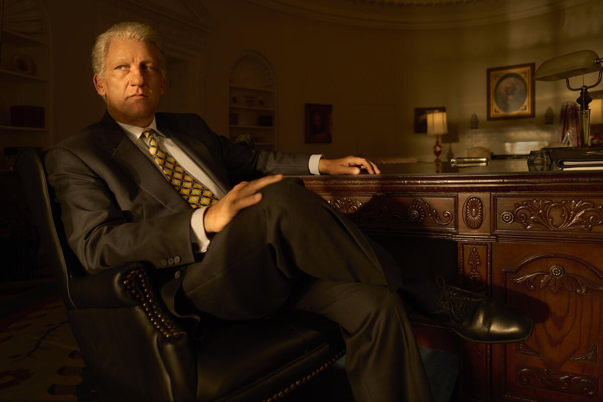  Clive Owen in costume as Bill Clinton on an Oval Office set