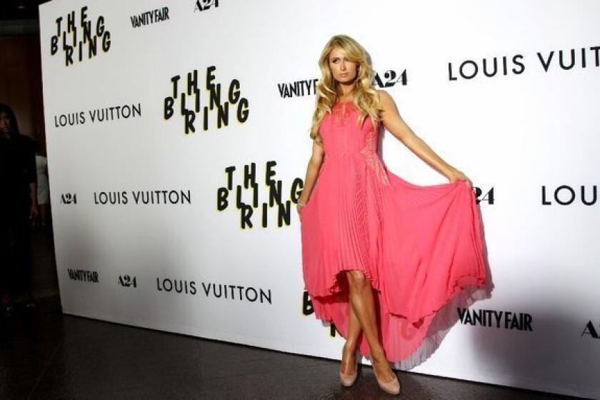 Paris Hilton arrives at the L.A. premiere of "The Bling Ring" at the Directors Guild of America.