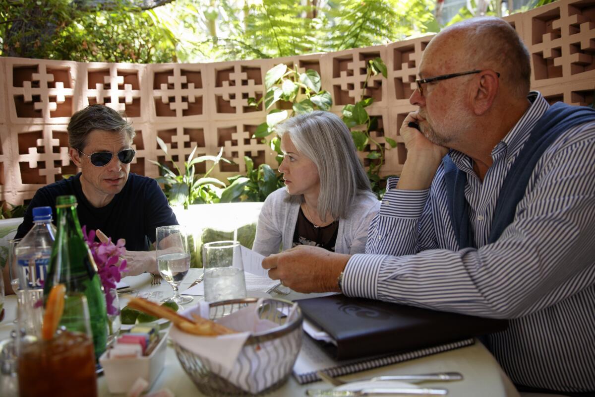 Berggruen, left, meets with Dawn Nakagawa and Nathan Gardels from the Berggruen Institute board of directors over lunch at the Polo Lounge inside the Beverly Hills Hotel.