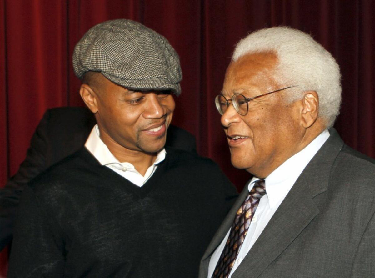 Cuba Gooding Jr. pays his respects to civil rights leader Rev. James Lawson at a special screening of "Lee Daniels' The Butler."