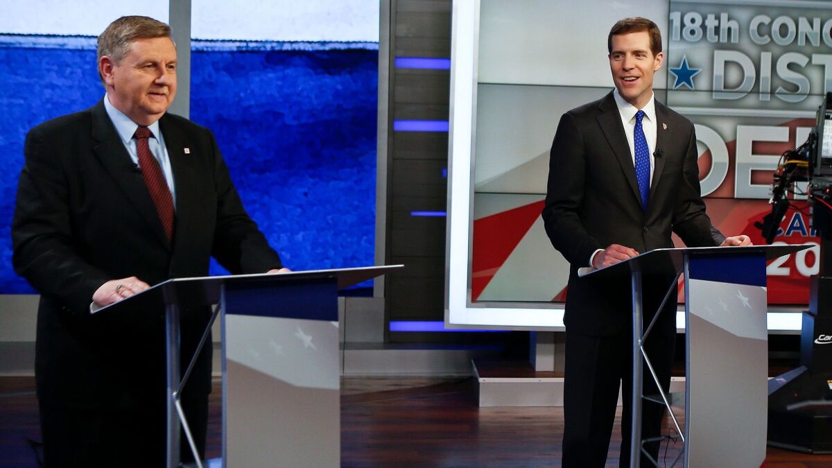 Republican Rick Saccone, left, and Democrat Conor Lamb before the taping of their first debate in the special election.