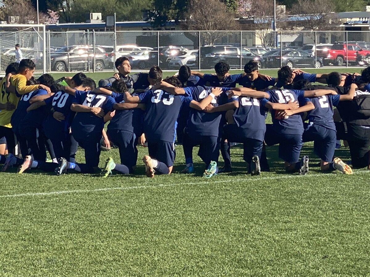 Birmingham players gather before Wednesday's City Section Division I soccer playoff opener against Locke.