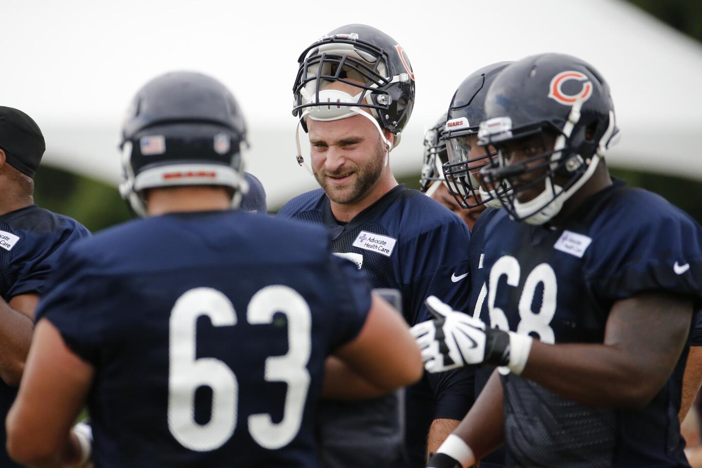Bears offensive guard Kyle Long with other offensive linemen during the first day of Bears training camp at Olivet Nazarene University in Bourbonnais on Thursday, July 27, 2017.