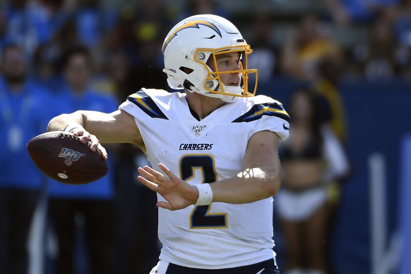 CARSON, CA - AUGUST 18: Quarterback Easton Stick #2 of the Los Angeles Chargers throws against New Orleans Saints during the second half of their pre season football game at Dignity Health Sports Park on August 18, 2019 in Carson, California. (Photo by Kevork Djansezian/Getty Images)