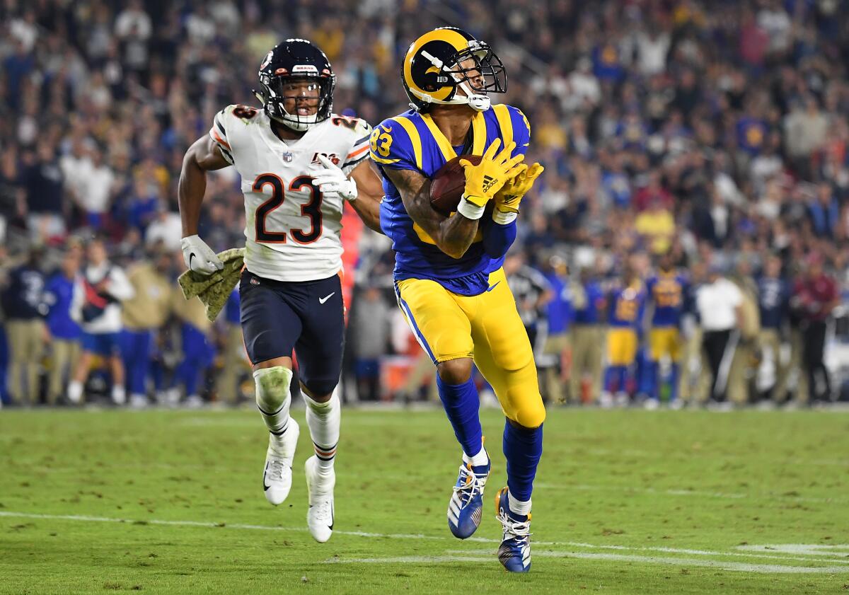 Rams receiver Josh Reynolds catches a long pass in front of Chicago Bears cornerback Kyle Fuller.