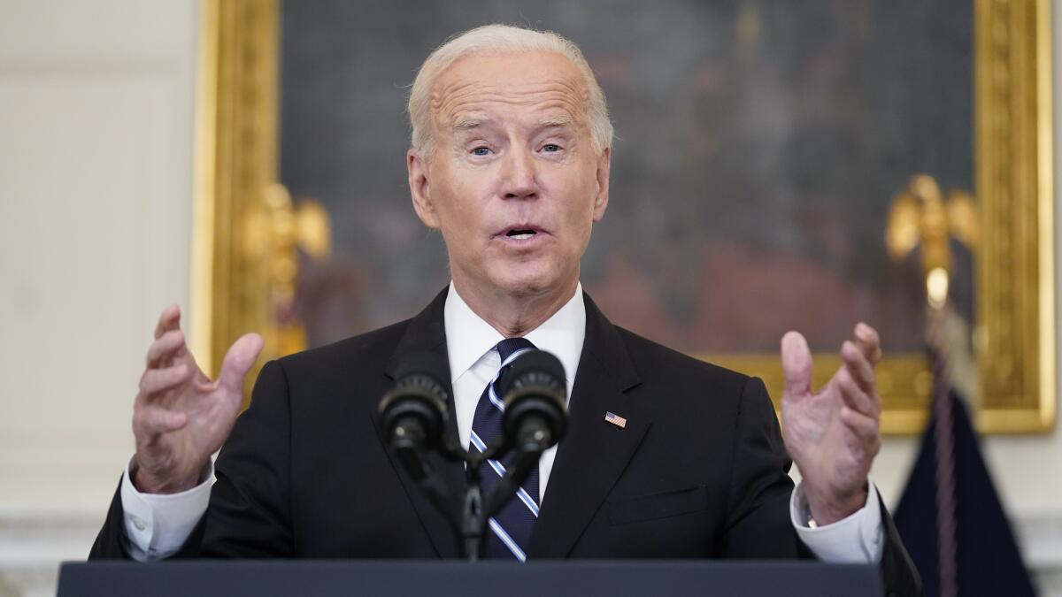 President Biden speaks in the State Dining Room at the White House in 2021.