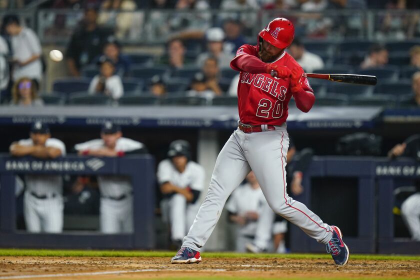 Los Angeles Angels' Jared Walsh hits a double against the New York Yankees during the eighth inning in the second baseball game of a doubleheader Thursday, June 2, 2022, in New York. (AP Photo/Frank Franklin II)