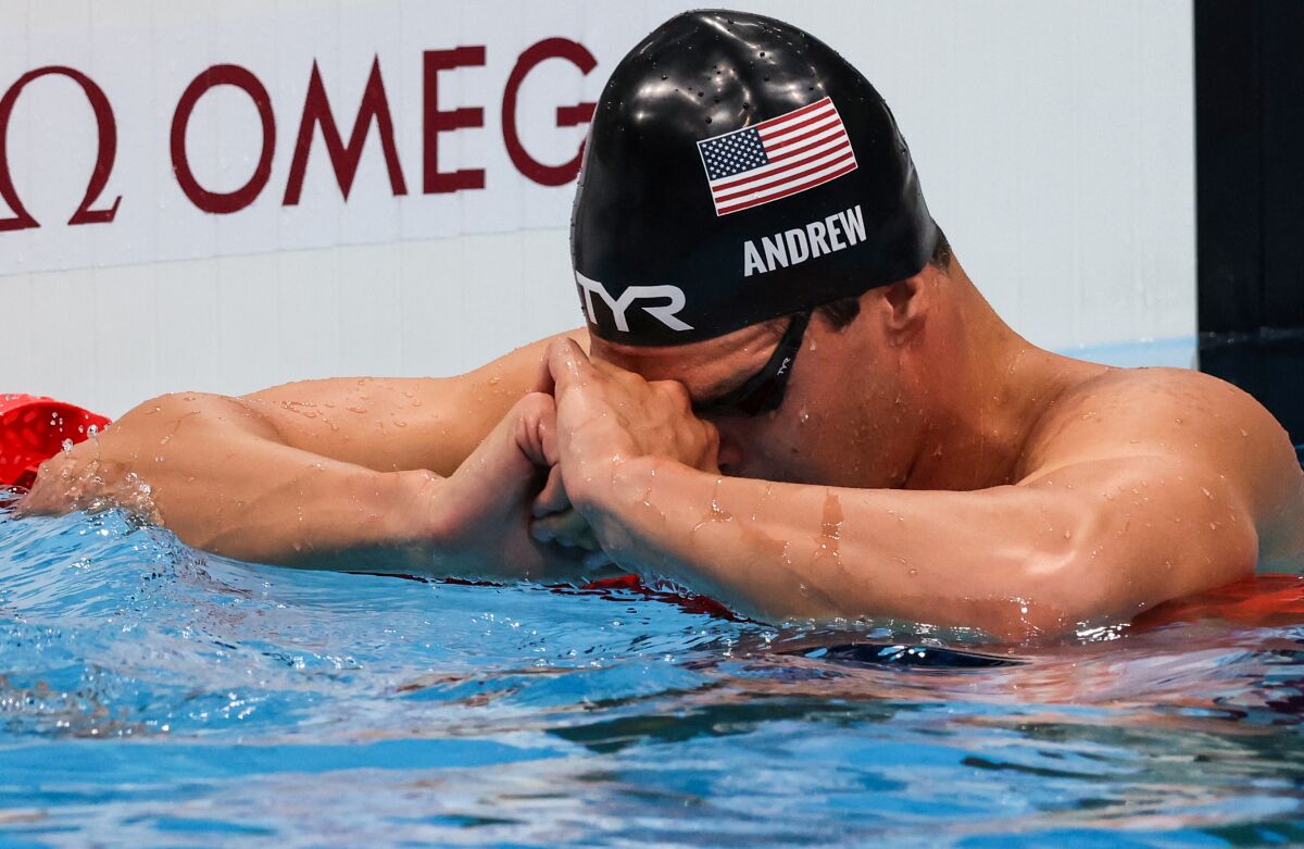 U.S. swimmer Michael Andrew pauses after finishing fifth in the 200-meter individual medley on Friday.