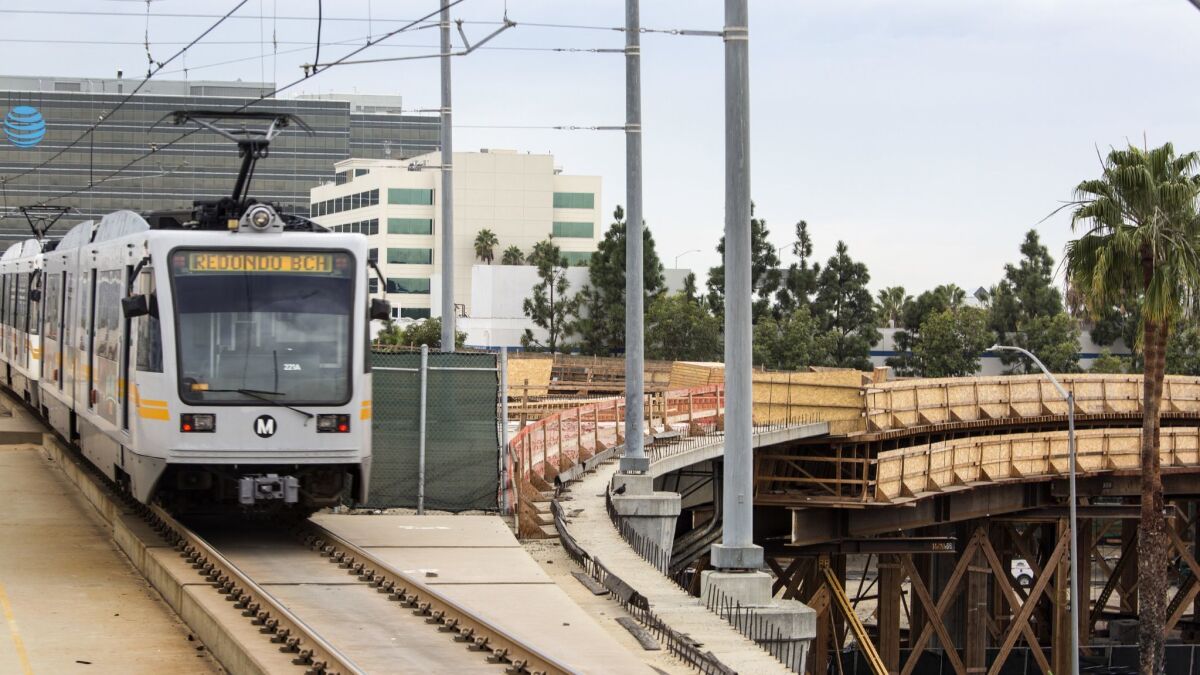 A Metro Green Line train passes the junction with the future Crenshaw Line in 2016.