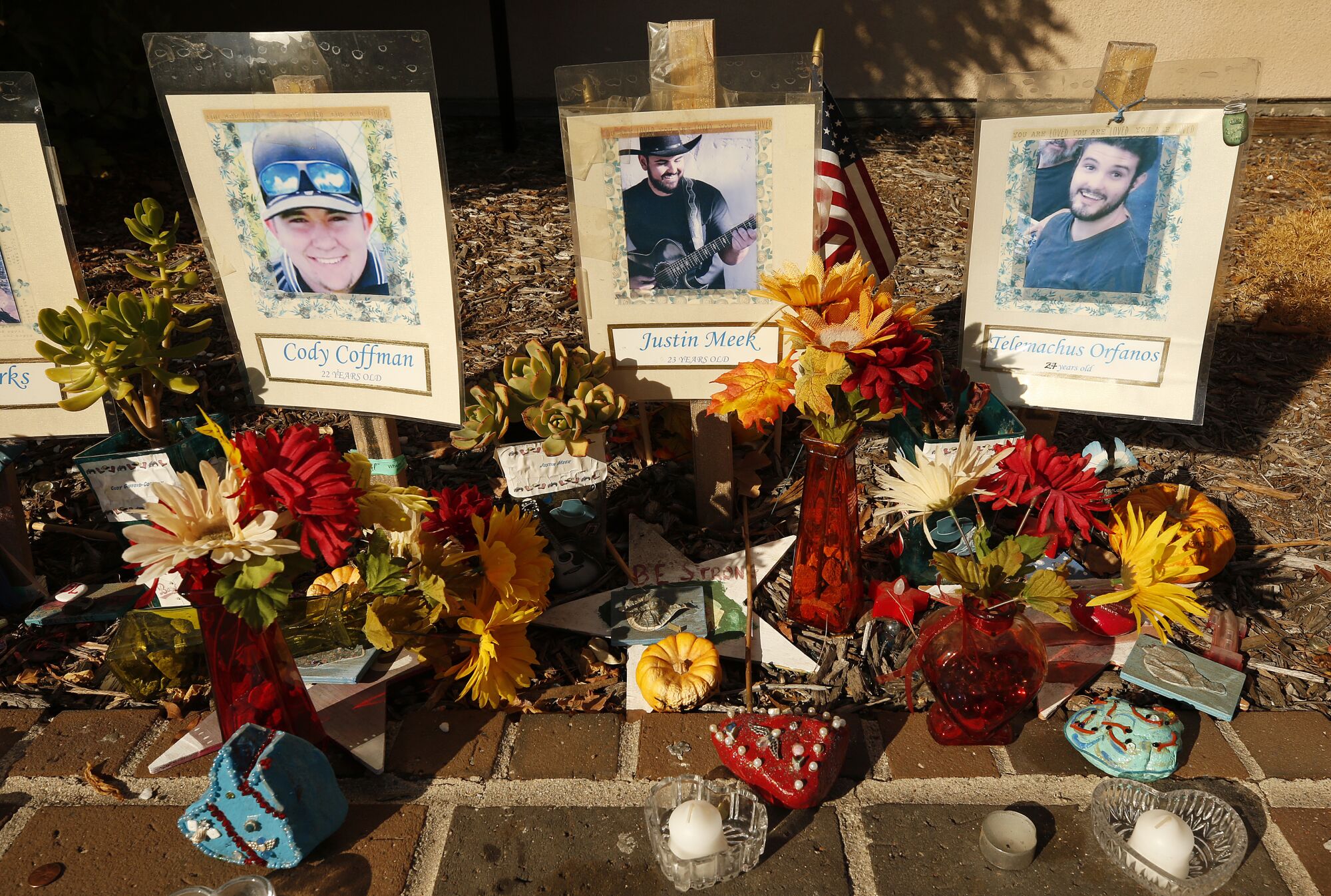 A memorial to the 12 victims of the Borderline Bar & Grill mass shooting in Thousand Oaks continues to stand as people come to pay respects in front of the country-western bar frequented by college students at the one year anniversary of the shooting on Nov 7, 2018.
