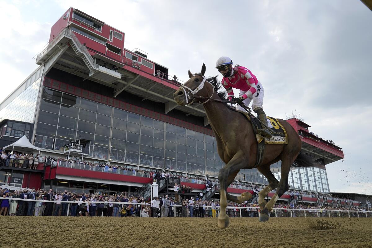 Flavien Prat atop Rombauer wins the 146th Preakness Stakes at Pimlico Race Course