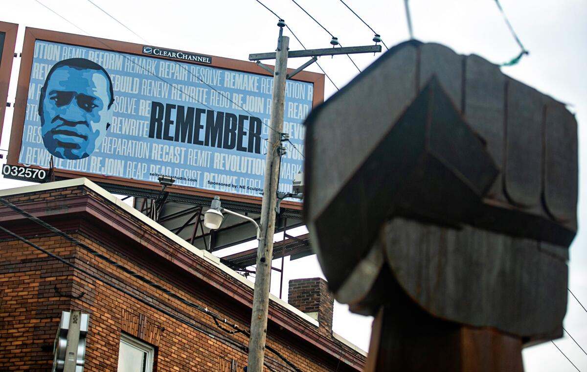 A billboard above the south Minneapolis intersection where George Floyd died
