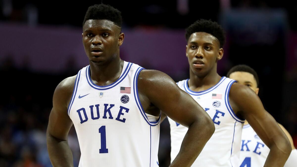 Duke's Zion Williamson, left, and teammate RJ Barrett are shown during a game against Syracuse during the ACC tournament quarterfinals on Thursday.