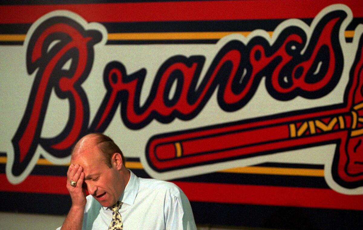 Atlanta Braves president Stan Kasten speaks to reporters in September 1994.