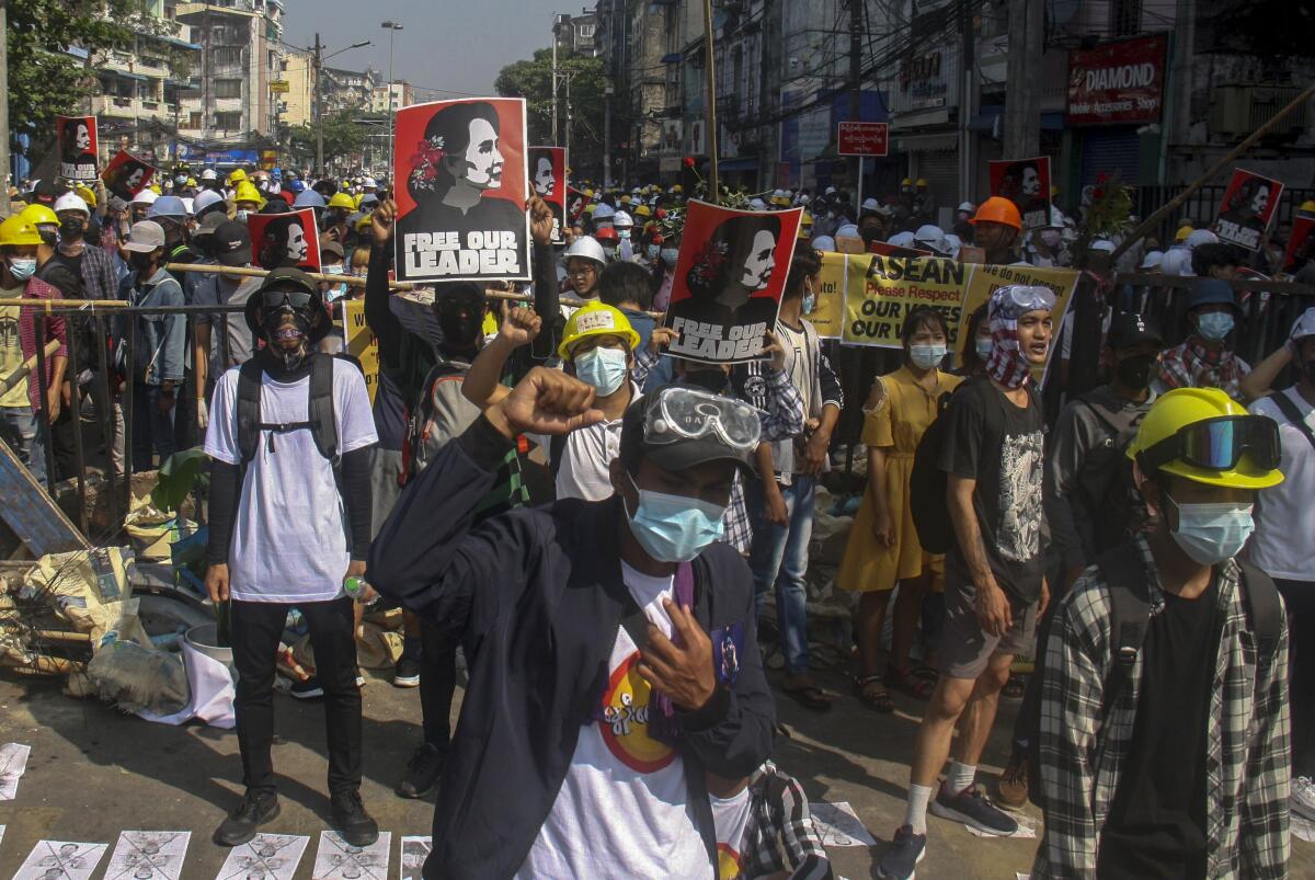 Protesters on a street in Yangon, Myanmar.