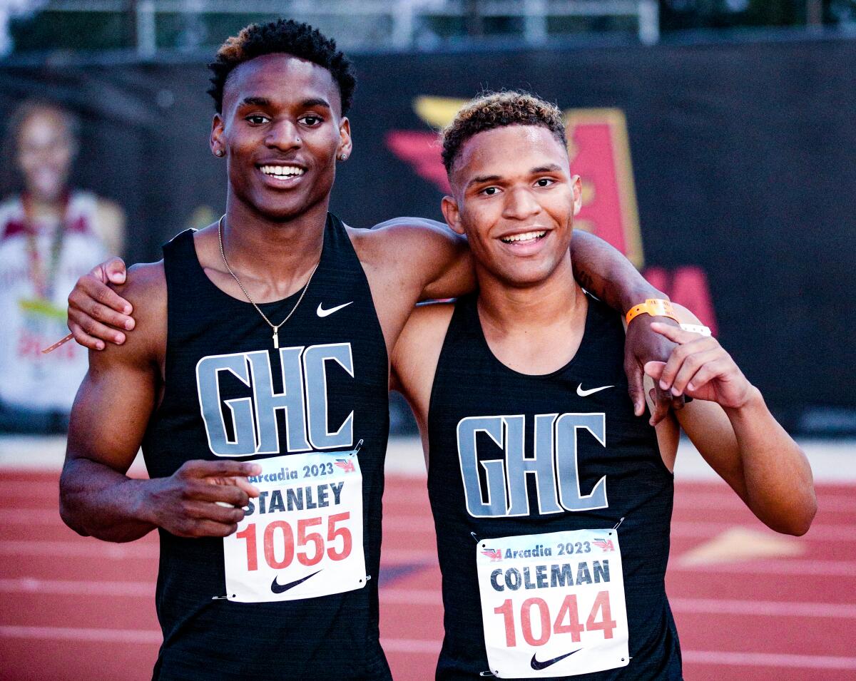 Granada Hills High track stars Dijon Stanley, left, and Jordan Coleman pose for a photo.