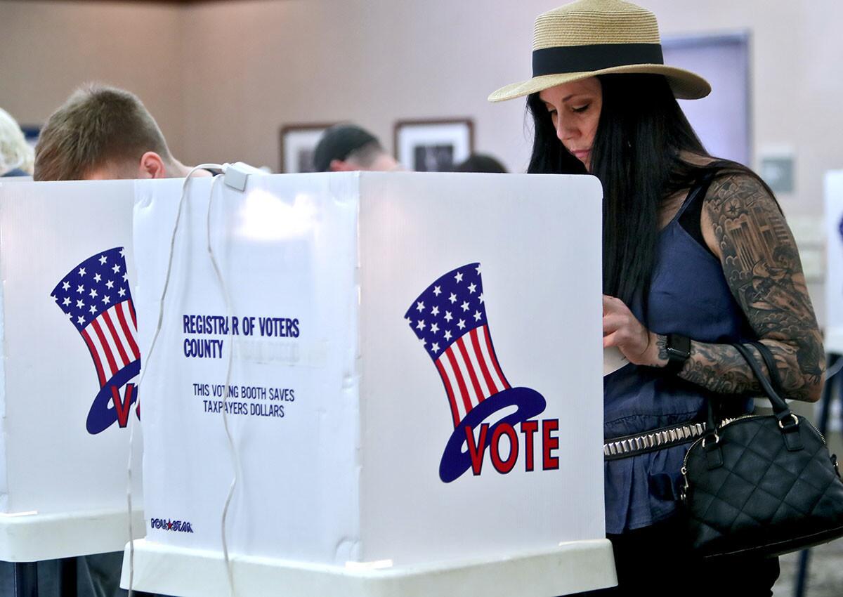 Shay Gipson, 46 of Burbank, votes at the Buena Vista Library polling location in Burbank on Tuesday, Nov, 6, 2018.